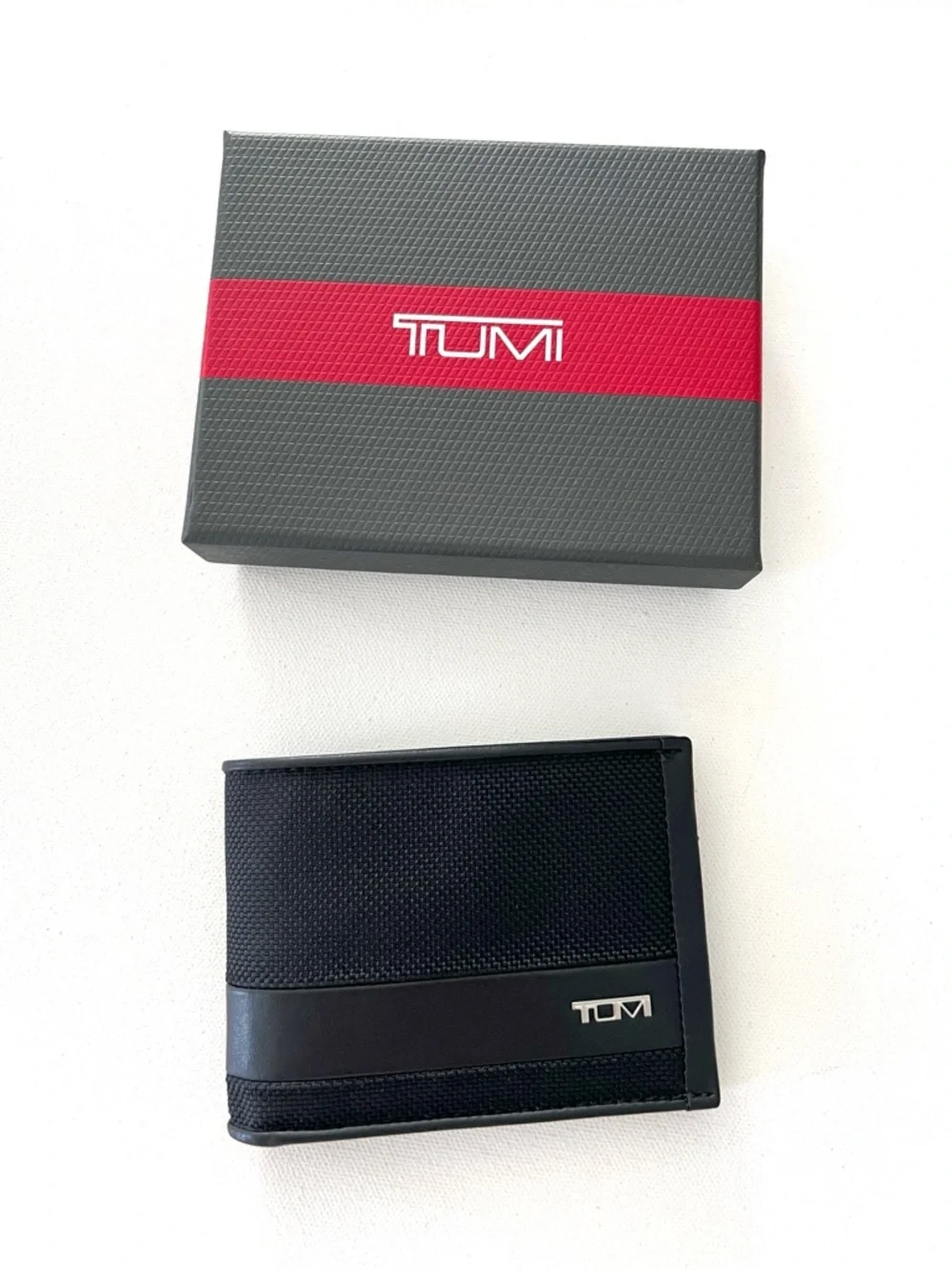 TUMI Alpha SLG Double Billfold Wallet in Black Embossed Monogram LRM New